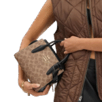 شنطة كوتش أندريا كاريال – قماش مطلي مميز – متوفرة بعدة أحجام