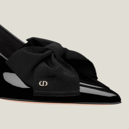 صورة أمامية لحذاء ديوريسيمو النسائي الأسود مع الفيونكة الذهبية